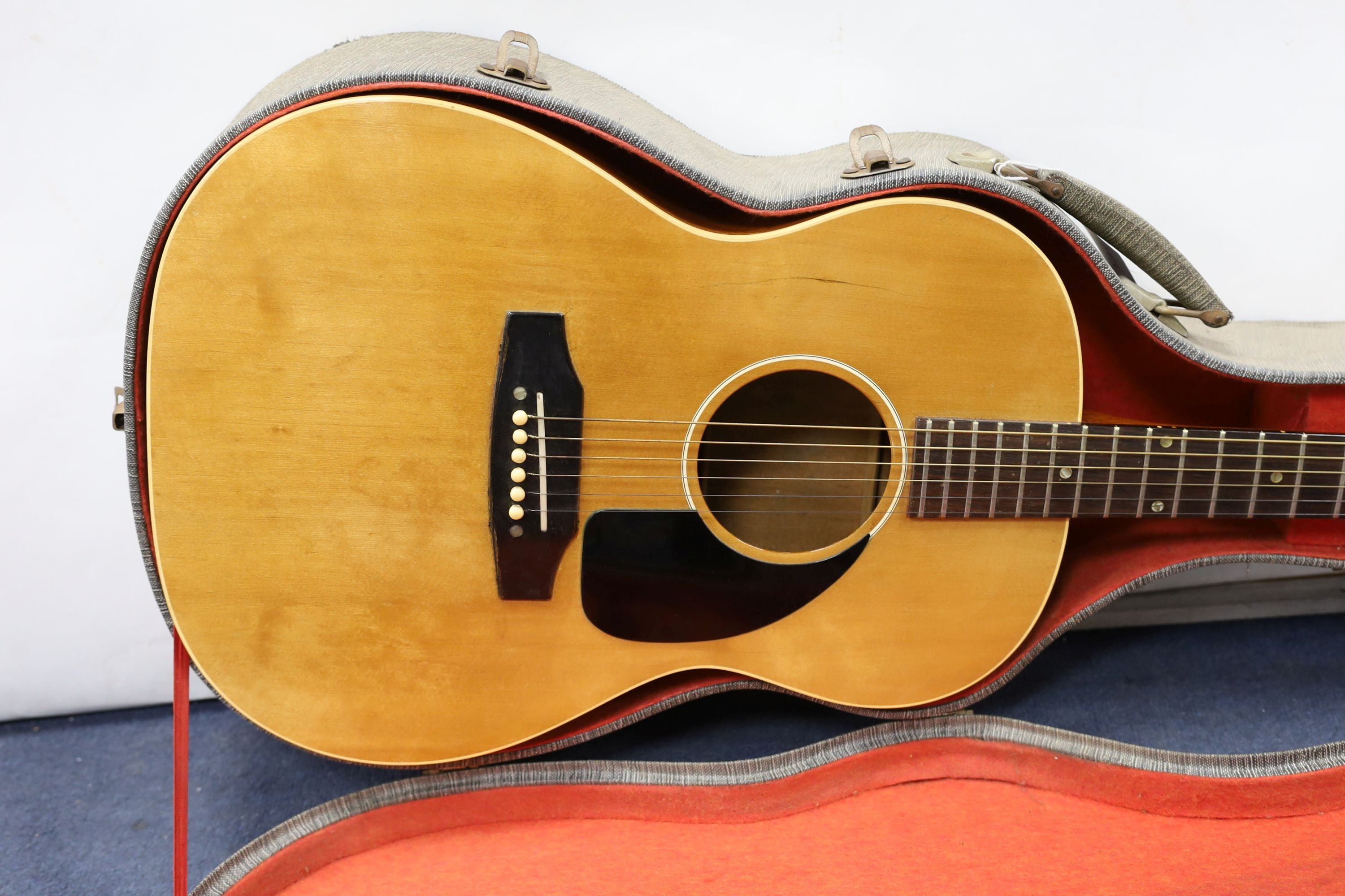 A Gibson acoustic guitar in hard case, serial no. 430 862